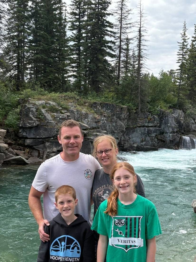 The Oldenburger family by a river